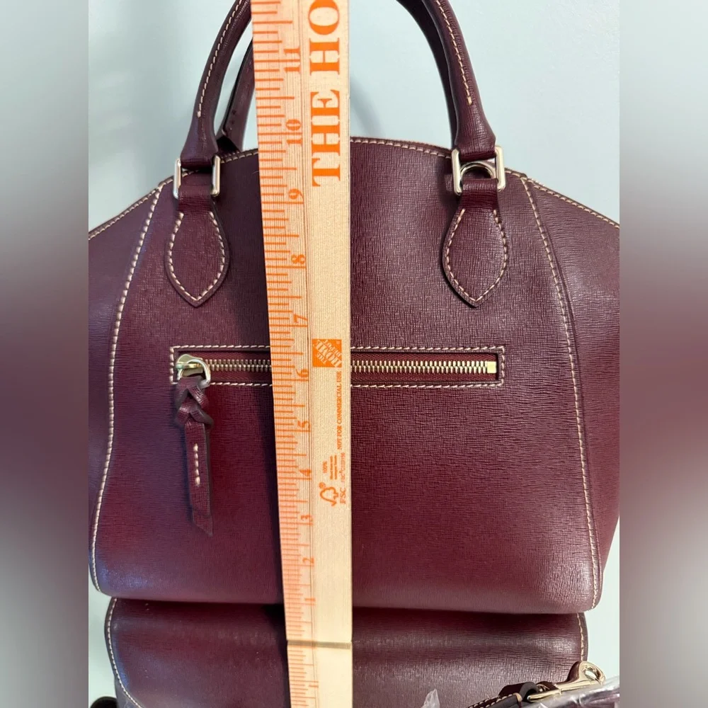 Dooney & Bourke reposhing this